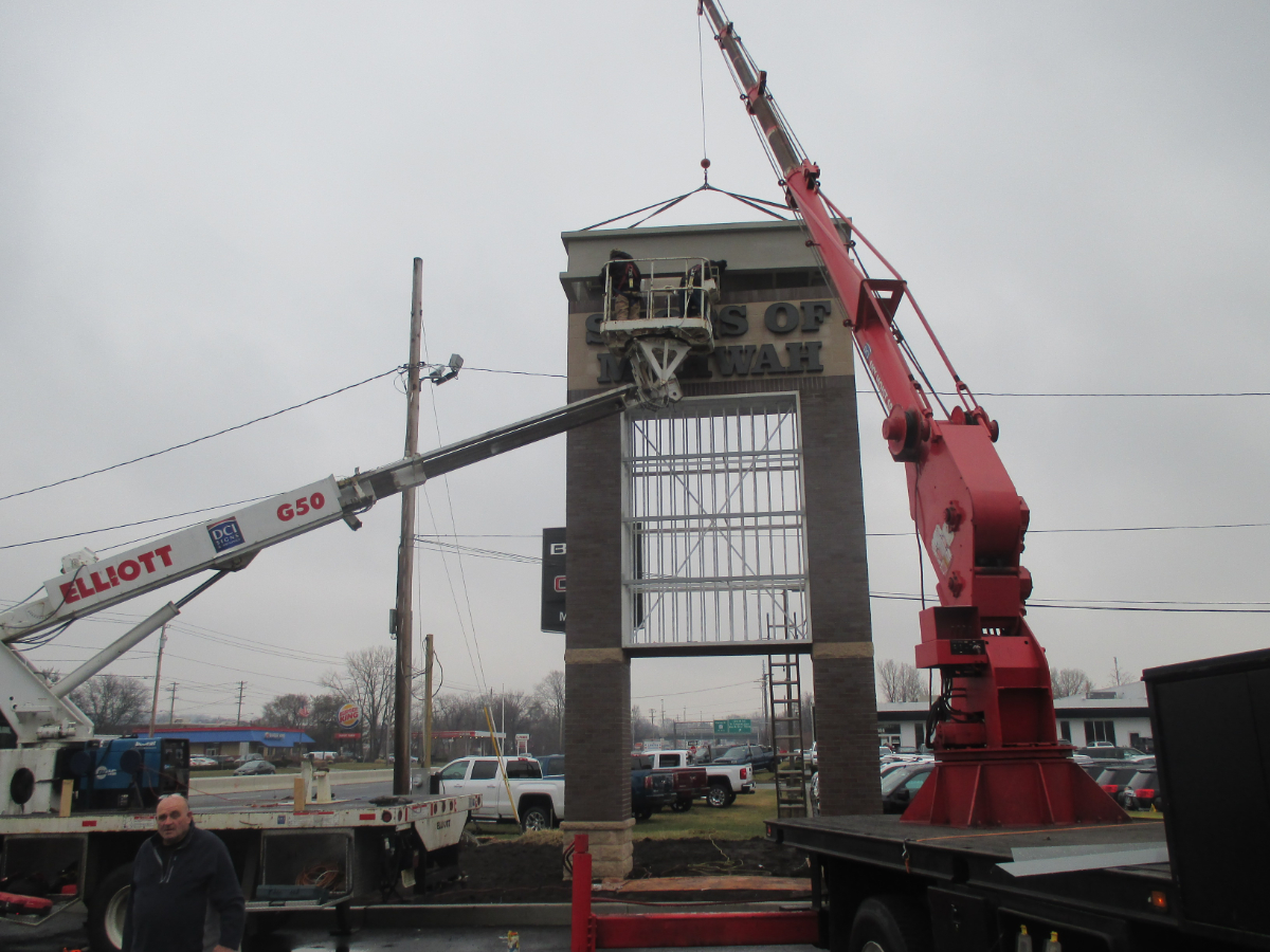 sign-being-installed